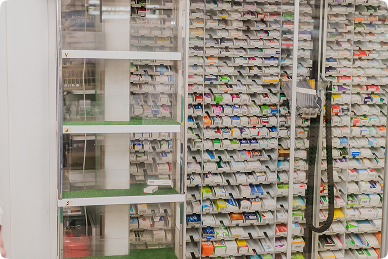 Extensive medicine shelves in ANC pharmacy