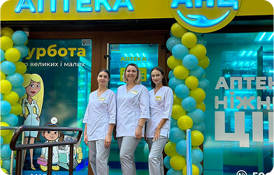 Three ANC team members at store entrance